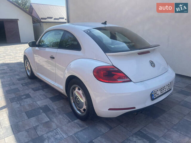 Білий Фольксваген Бітл, об'ємом двигуна 1.8 л та пробігом 99 тис. км за 11800 $, фото 5 на Automoto.ua