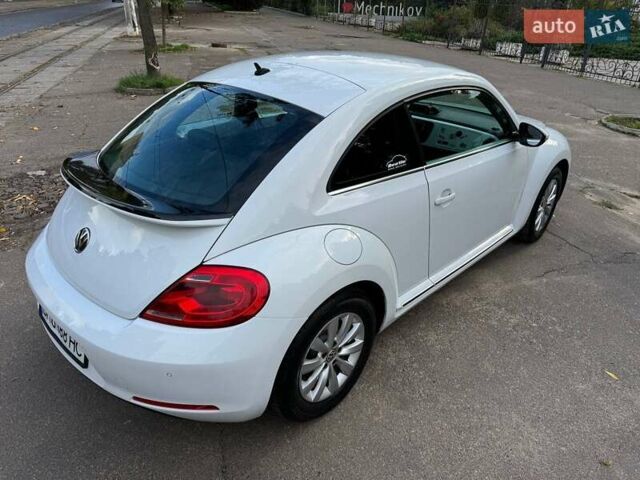 Білий Фольксваген Бітл, об'ємом двигуна 1.39 л та пробігом 65 тис. км за 13500 $, фото 2 на Automoto.ua