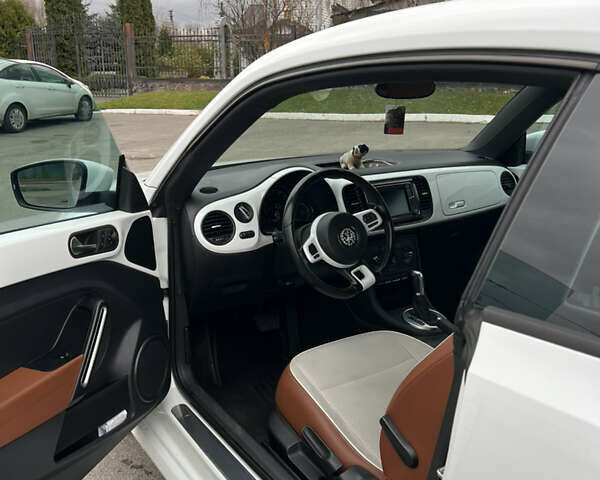 Белый Фольксваген Битл, объемом двигателя 1.8 л и пробегом 107 тыс. км за 12499 $, фото 6 на Automoto.ua