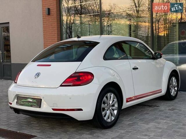 Белый Фольксваген Битл, объемом двигателя 1.8 л и пробегом 121 тыс. км за 11990 $, фото 13 на Automoto.ua