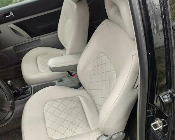 Черный Фольксваген Битл, объемом двигателя 2 л и пробегом 230 тыс. км за 4100 $, фото 1 на Automoto.ua