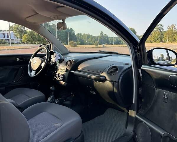 Черный Фольксваген Битл, объемом двигателя 1.6 л и пробегом 210 тыс. км за 5900 $, фото 5 на Automoto.ua