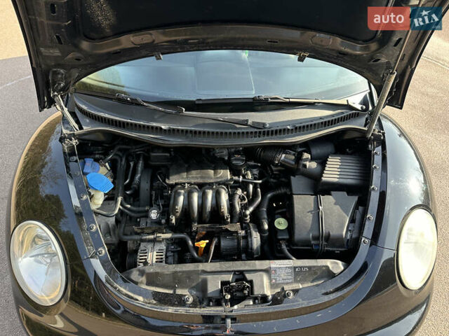 Черный Фольксваген Битл, объемом двигателя 1.6 л и пробегом 210 тыс. км за 5900 $, фото 8 на Automoto.ua