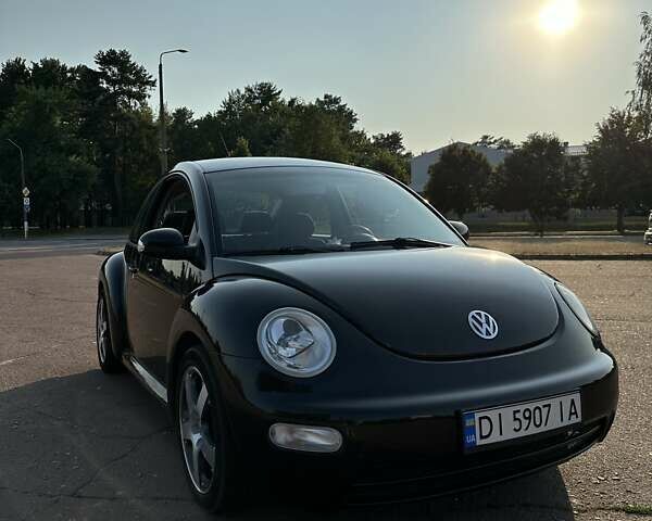 Черный Фольксваген Битл, объемом двигателя 1.6 л и пробегом 210 тыс. км за 5900 $, фото 1 на Automoto.ua