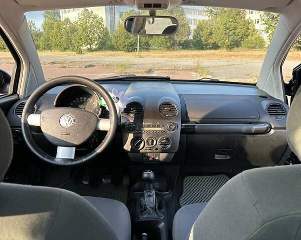 Черный Фольксваген Битл, объемом двигателя 1.6 л и пробегом 210 тыс. км за 5900 $, фото 4 на Automoto.ua