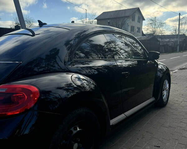 Чорний Фольксваген Бітл, об'ємом двигуна 2.48 л та пробігом 126 тис. км за 10000 $, фото 4 на Automoto.ua