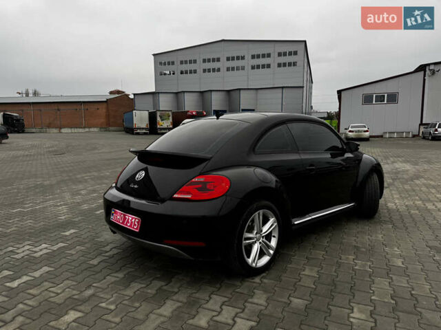 Черный Фольксваген Битл, объемом двигателя 1.8 л и пробегом 194 тыс. км за 12500 $, фото 3 на Automoto.ua