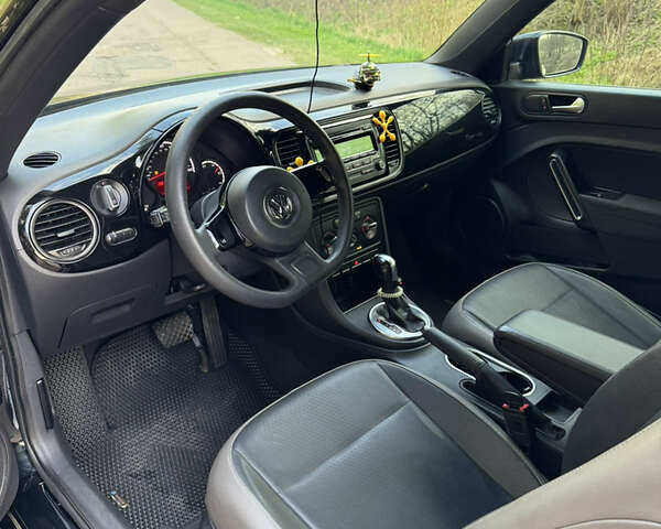 Черный Фольксваген Битл, объемом двигателя 1.8 л и пробегом 180 тыс. км за 8750 $, фото 7 на Automoto.ua