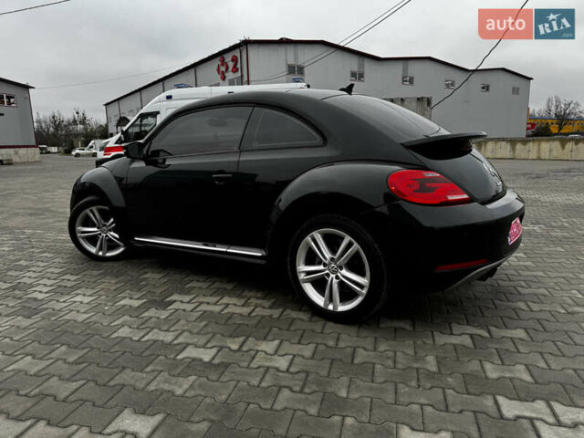 Черный Фольксваген Битл, объемом двигателя 1.8 л и пробегом 194 тыс. км за 12500 $, фото 10 на Automoto.ua