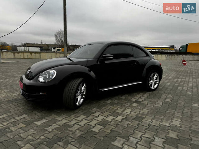 Черный Фольксваген Битл, объемом двигателя 1.8 л и пробегом 194 тыс. км за 12500 $, фото 12 на Automoto.ua