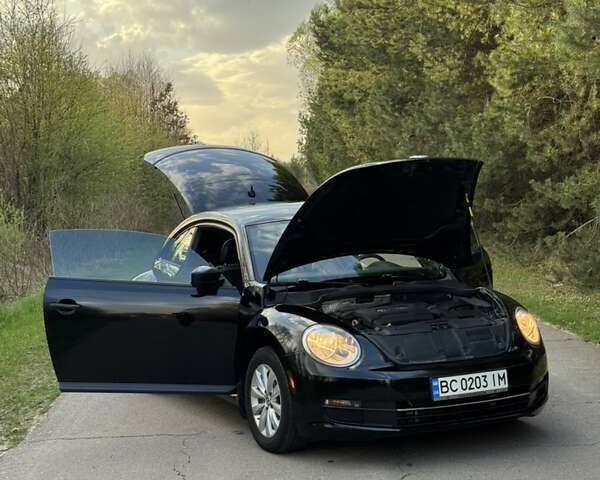 Черный Фольксваген Битл, объемом двигателя 1.8 л и пробегом 180 тыс. км за 8750 $, фото 5 на Automoto.ua