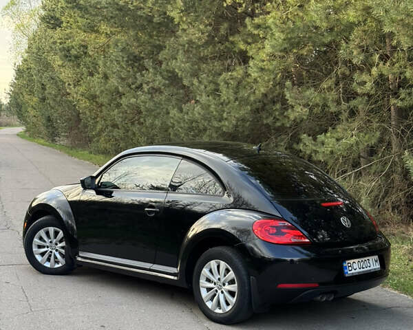 Черный Фольксваген Битл, объемом двигателя 1.8 л и пробегом 180 тыс. км за 8750 $, фото 4 на Automoto.ua