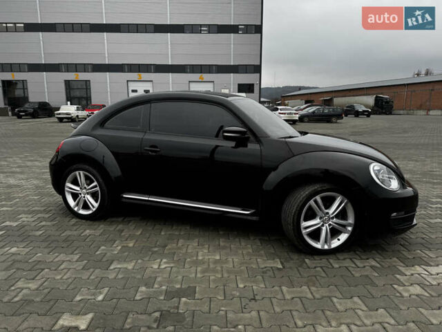 Черный Фольксваген Битл, объемом двигателя 1.8 л и пробегом 194 тыс. км за 12500 $, фото 1 на Automoto.ua