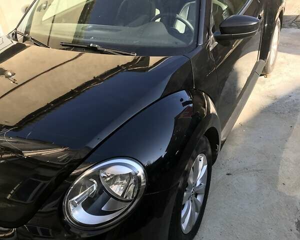 Черный Фольксваген Битл, объемом двигателя 1.8 л и пробегом 167 тыс. км за 10500 $, фото 1 на Automoto.ua