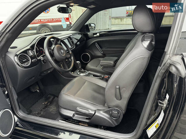 Черный Фольксваген Битл, объемом двигателя 1.8 л и пробегом 194 тыс. км за 12500 $, фото 26 на Automoto.ua