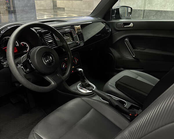 Черный Фольксваген Битл, объемом двигателя 1.8 л и пробегом 56 тыс. км за 12300 $, фото 13 на Automoto.ua