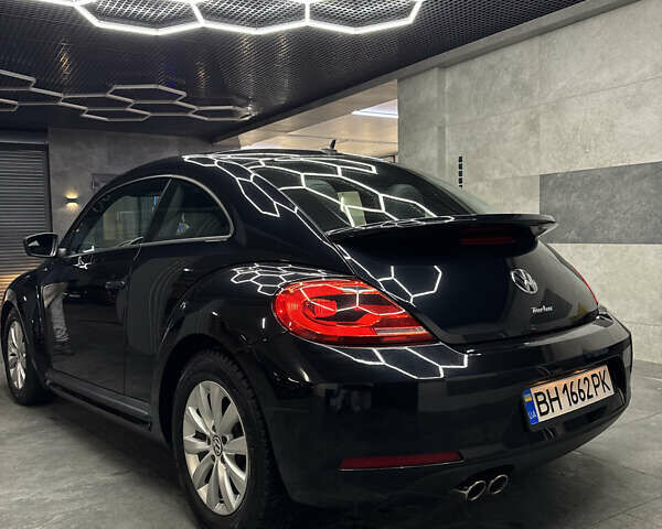 Черный Фольксваген Битл, объемом двигателя 1.8 л и пробегом 56 тыс. км за 12300 $, фото 15 на Automoto.ua