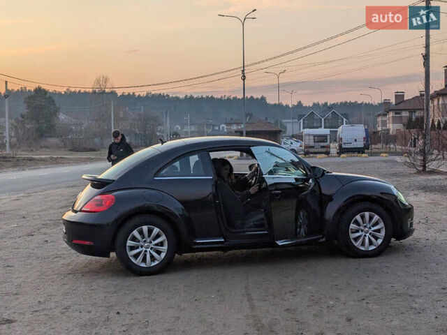 Чорний Фольксваген Бітл, об'ємом двигуна 1.39 л та пробігом 230 тис. км за 12000 $, фото 2 на Automoto.ua