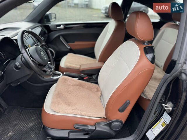 Черный Фольксваген Битл, объемом двигателя 1.8 л и пробегом 96 тыс. км за 12900 $, фото 15 на Automoto.ua