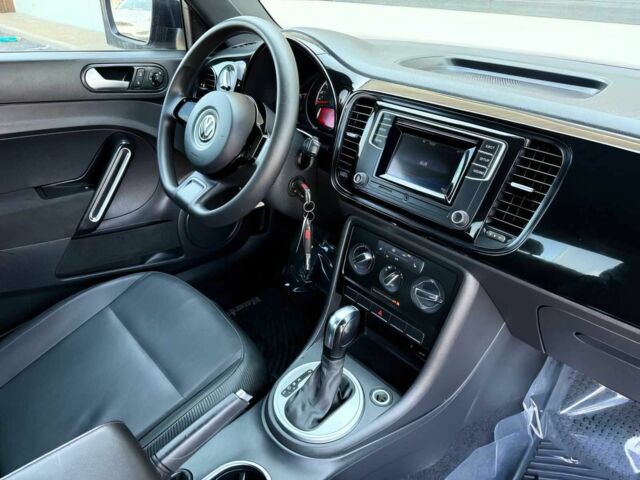 Черный Фольксваген Битл, объемом двигателя 1.8 л и пробегом 70 тыс. км за 5400 $, фото 9 на Automoto.ua