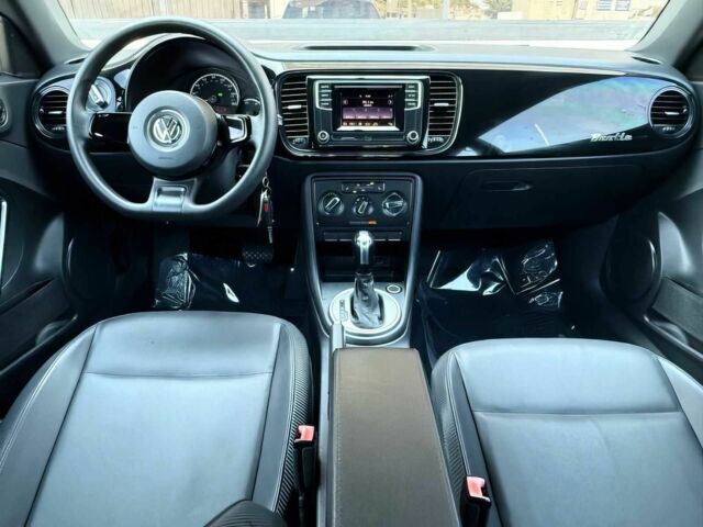 Черный Фольксваген Битл, объемом двигателя 1.8 л и пробегом 70 тыс. км за 5400 $, фото 12 на Automoto.ua