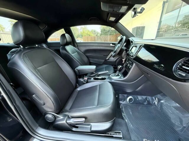 Черный Фольксваген Битл, объемом двигателя 1.8 л и пробегом 70 тыс. км за 5400 $, фото 7 на Automoto.ua