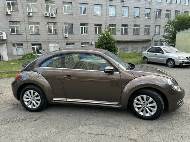 Коричневый Фольксваген Битл, объемом двигателя 1.4 л и пробегом 117 тыс. км за 12000 $, фото 4 на Automoto.ua