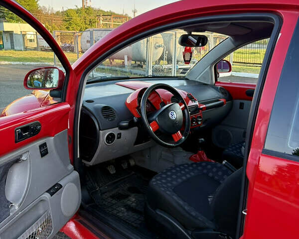 Красный Фольксваген Битл, объемом двигателя 1.9 л и пробегом 283 тыс. км за 2999 $, фото 9 на Automoto.ua