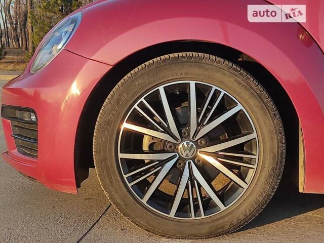 Красный Фольксваген Битл, объемом двигателя 1.8 л и пробегом 130 тыс. км за 12900 $, фото 56 на Automoto.ua