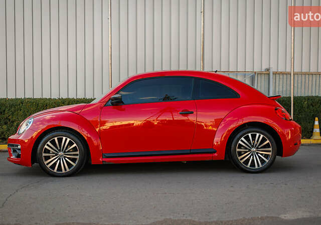 Красный Фольксваген Битл, объемом двигателя 1.98 л и пробегом 74 тыс. км за 13200 $, фото 1 на Automoto.ua