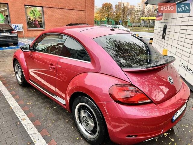 Красный Фольксваген Битл, объемом двигателя 1.39 л и пробегом 58 тыс. км за 16403 $, фото 1 на Automoto.ua
