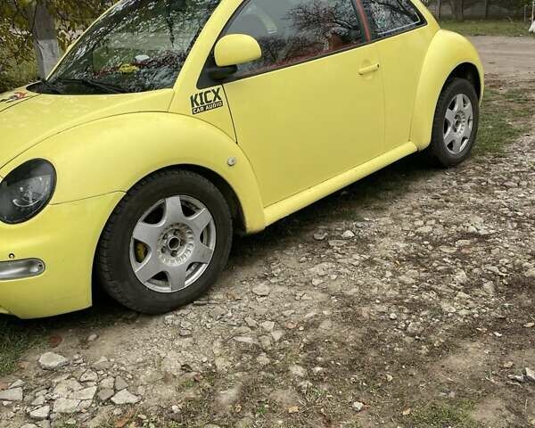 Желтый Фольксваген Битл, объемом двигателя 2 л и пробегом 307 тыс. км за 5450 $, фото 1 на Automoto.ua