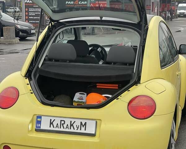 Желтый Фольксваген Битл, объемом двигателя 1.6 л и пробегом 283 тыс. км за 3300 $, фото 7 на Automoto.ua