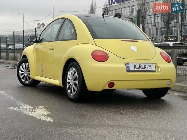 Желтый Фольксваген Битл, объемом двигателя 1.6 л и пробегом 283 тыс. км за 3300 $, фото 2 на Automoto.ua