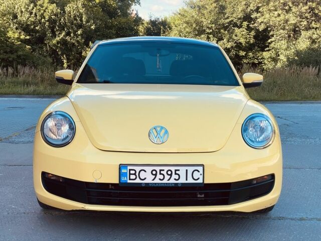 Жовтий Фольксваген Бітл, об'ємом двигуна 2.5 л та пробігом 146 тис. км за 11700 $, фото 1 на Automoto.ua