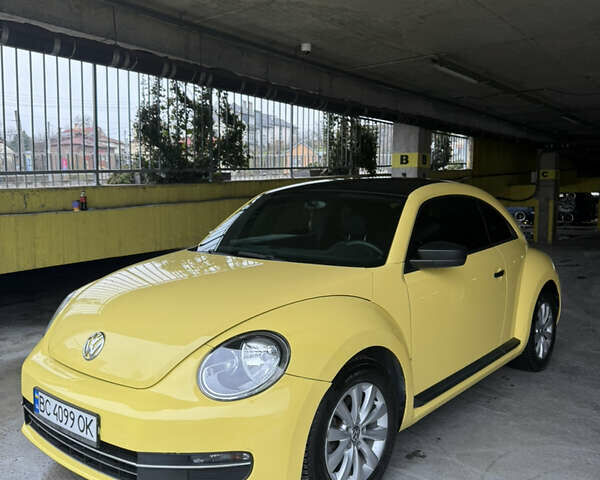Желтый Фольксваген Битл, объемом двигателя 1.8 л и пробегом 157 тыс. км за 9900 $, фото 1 на Automoto.ua