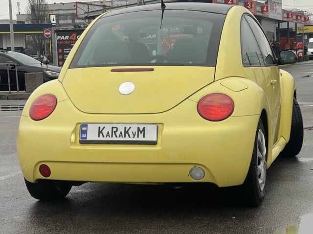 Желтый Фольксваген Битл, объемом двигателя 1.6 л и пробегом 283 тыс. км за 3100 $, фото 3 на Automoto.ua