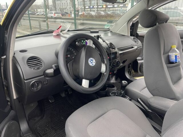 Желтый Фольксваген Битл, объемом двигателя 1.6 л и пробегом 283 тыс. км за 3100 $, фото 7 на Automoto.ua