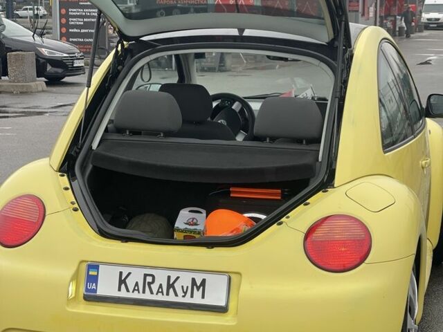 Желтый Фольксваген Битл, объемом двигателя 1.6 л и пробегом 283 тыс. км за 3100 $, фото 2 на Automoto.ua