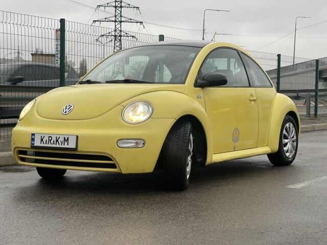 Желтый Фольксваген Битл, объемом двигателя 1.6 л и пробегом 283 тыс. км за 3100 $, фото 1 на Automoto.ua