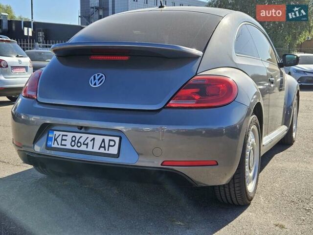 Сірий Фольксваген Бітл, об'ємом двигуна 1.8 л та пробігом 249 тис. км за 8300 $, фото 2 на Automoto.ua