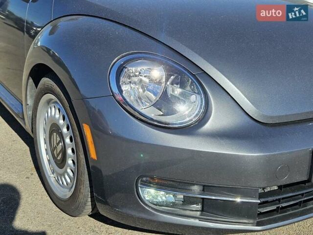 Сірий Фольксваген Бітл, об'ємом двигуна 1.8 л та пробігом 249 тис. км за 8300 $, фото 4 на Automoto.ua