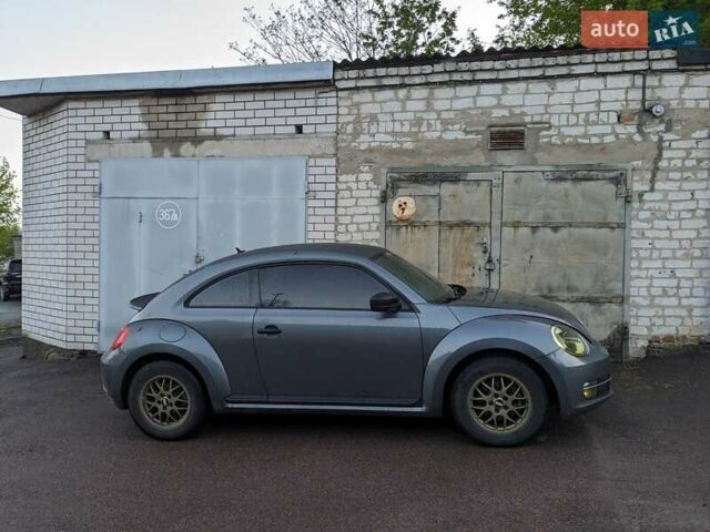 Сірий Фольксваген Бітл, об'ємом двигуна 1.8 л та пробігом 85 тис. км за 11999 $, фото 6 на Automoto.ua