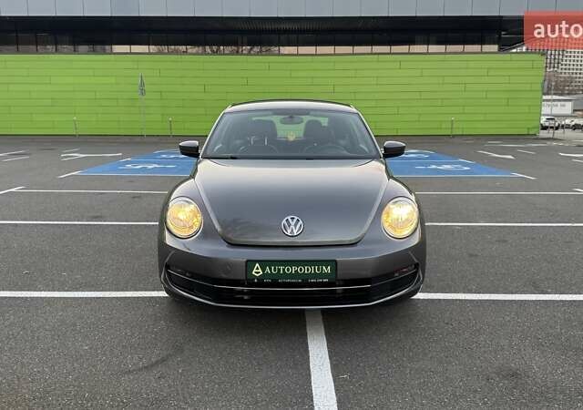 Сірий Фольксваген Бітл, об'ємом двигуна 1.8 л та пробігом 82 тис. км за 12499 $, фото 2 на Automoto.ua