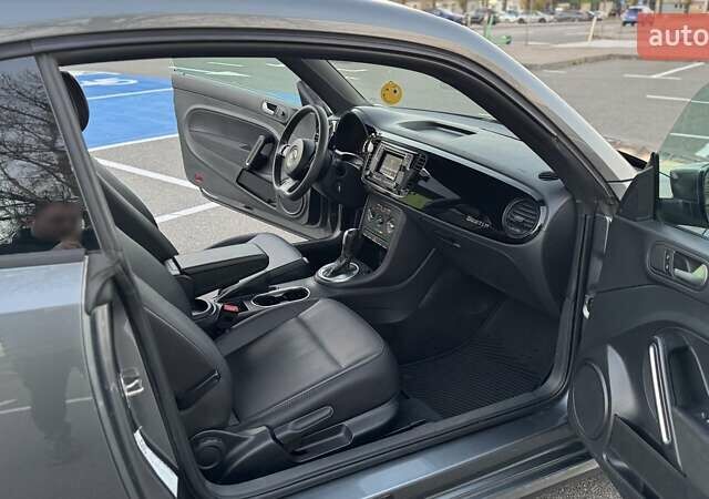 Сірий Фольксваген Бітл, об'ємом двигуна 1.8 л та пробігом 82 тис. км за 12499 $, фото 21 на Automoto.ua