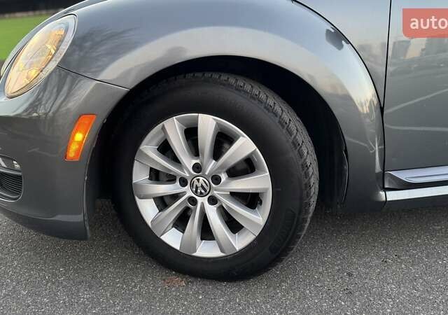 Сірий Фольксваген Бітл, об'ємом двигуна 1.8 л та пробігом 82 тис. км за 12499 $, фото 12 на Automoto.ua