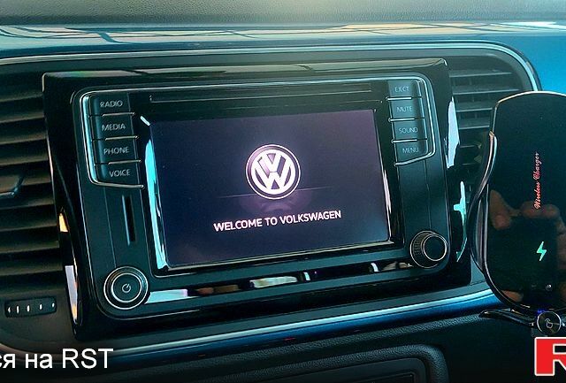 Синий Фольксваген Битл, объемом двигателя 1.4 л и пробегом 71 тыс. км за 12800 $, фото 4 на Automoto.ua