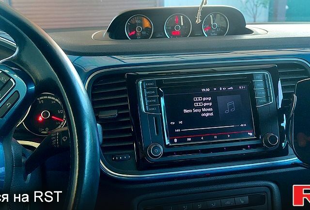 Синий Фольксваген Битл, объемом двигателя 1.4 л и пробегом 71 тыс. км за 12800 $, фото 6 на Automoto.ua