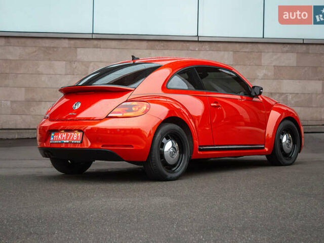 Оранжевый Фольксваген Битл, объемом двигателя 1.8 л и пробегом 60 тыс. км за 13800 $, фото 1 на Automoto.ua