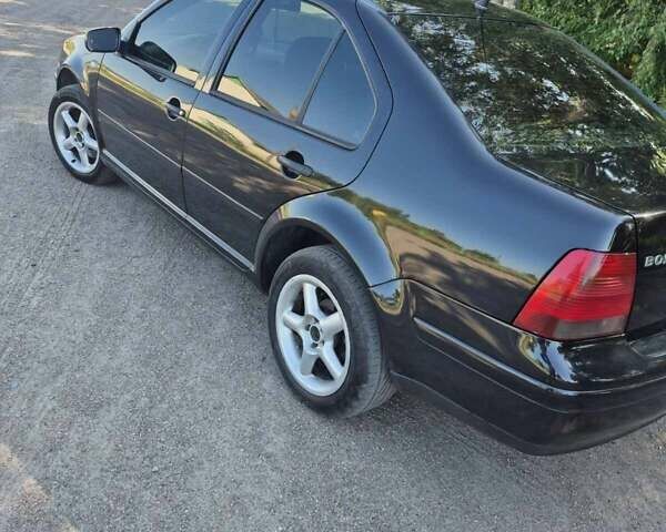 Черный Фольксваген Бора, объемом двигателя 1.6 л и пробегом 305 тыс. км за 4200 $, фото 7 на Automoto.ua